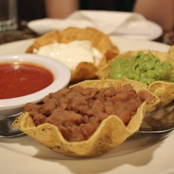 Sneaky Dee's - Mexi-Dip close-up of salsa, sour cream, guac, & frijoles - Tex-Mex Near Me - Toronto, Ontario