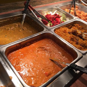Himalayan Exotic Indian Cuisine - Tikka Marsala to the bottom left. Goat curry to the top left. Tandoori chicken to the top right. - Indian Near Me - Malvern, Pennsylvania Himalayan Exotic Indian Cuisine - Tikka Marsala to the bottom left. Goat curry to the top left. Tandoori chicken to the top right. - Indian Near Me - Malvern, Pennsylvania