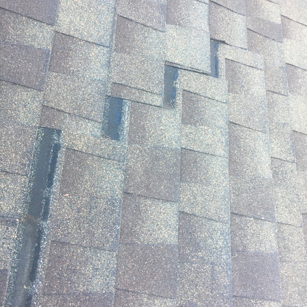 Becker Enterprises - Another section of asphalt shingles beginning to slid off the roof. - General Contractors Near Me - Northridge, California