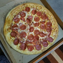 Little Caesar's Pizza - Where's the cheese and sauce? Pizza hut has $5 medium pizzas right now, and they have no problem using toppings.