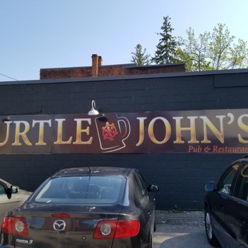 Turtle John's - cars parked in front of a restaurant - Pubs Near Me - Port Hope, Ontario Turtle John's - cars parked in front of a restaurant - Pubs Near Me - Port Hope, Ontario
