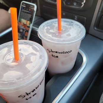 Dunkin' - two drinks in plastic cups with orange straws - Donuts Near Me - Concord, New Hampshire Dunkin' - two drinks in plastic cups with orange straws - Donuts Near Me - Concord, New Hampshire