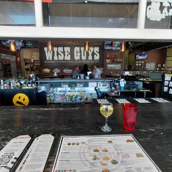Wise Guys Pizzeria - Sitting at outside bar. - Pizza Near Me - Roanoke, Texas Wise Guys Pizzeria - Sitting at outside bar. - Pizza Near Me - Roanoke, Texas