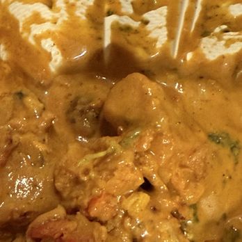 Cafe Maharani - Apparently according to the server this is tikka masala. Clearly a buttered chicken. They did not give us the side rice for this. - Indian Near Me - Honolulu, Hawaii