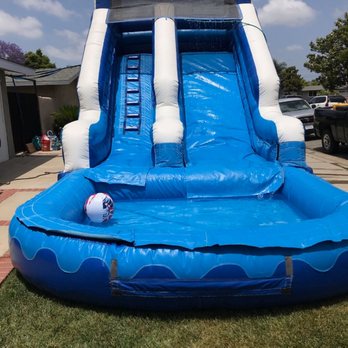 Jump Action - We have 12, 15 and 16 ft waterslides. These are very popular during holidays and the summer! - Bounce House Rentals Near Me - Orange, California