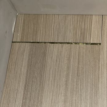 Toro Flooring - In my laundry room that the covered with a shelving unit thinking it wouldn't be moved or seen. - Flooring Near Me Toro Flooring - In my laundry room that the covered with a shelving unit thinking it wouldn't be moved or seen. - Flooring Near Me