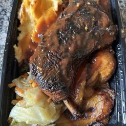 Jerk Chicken with 1/2 Mac n Cheese and 1/2 rice and beans. Jerk Chicken with 1/2 Mac n Cheese and 1/2 rice and beans.
