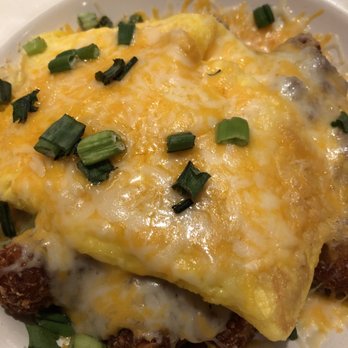 Delta 109 Tavern and Restaurant - 109 Casserole... tasty... tator tots, sausage gravy, cheese, scrambled egg, more cheese, topped with green onion garnish. Thumbs up!! - New American Near Me - Delta, Ohio Delta 109 Tavern and Restaurant - 109 Casserole... tasty... tator tots, sausage gravy, cheese, scrambled egg, more cheese, topped with green onion garnish. Thumbs up!! - New American Near Me - Delta, Ohio