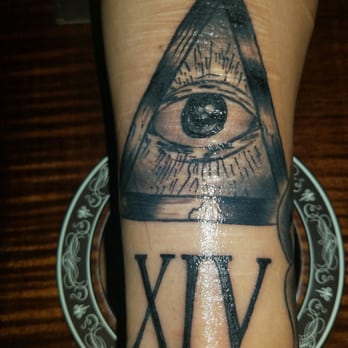 Sin City Tattoo and Body Piercing - Evil eye and anniversary date XIV by Thomas "Huero" - Tattoo Near Me - Pacoima, California