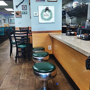 Murphy's Restaurant - a row of green stools - Irish Near Me - Redford, Michigan Murphy's Restaurant - a row of green stools - Irish Near Me - Redford, Michigan