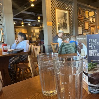 Cracker Barrel Old Country Store - a glass of water and a book on a table - American Near Me - Scottsburg, Indiana