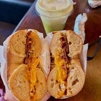 Gotham Bagels - Sesame bagel with bacon egg and American cheese, vanilla matcha latte - Bagels Near Me - Chicago, Illinois