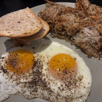 Sunny Side Up - Eggs with hash browns and sourdough toast. - Breakfast & Brunch Near Me - Easton, Pennsylvania Sunny Side Up - Eggs with hash browns and sourdough toast. - Breakfast & Brunch Near Me - Easton, Pennsylvania