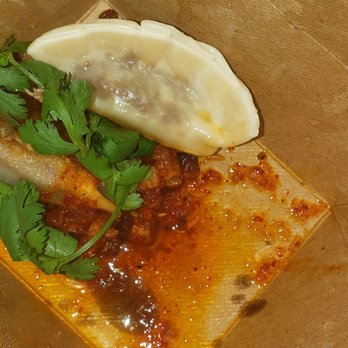 Community Tavern - Short rib dumplings..swimming in oil and a tad salty. - New American Near Me - Chicago, Illinois Community Tavern - Short rib dumplings..swimming in oil and a tad salty. - New American Near Me - Chicago, Illinois