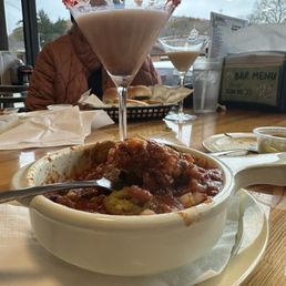 Bowl of chili and drunken snowman martini Bowl of chili and drunken snowman martini
