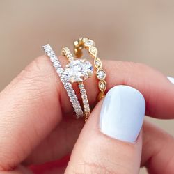Goodman's Jewelers - Oval diamond engagement ring with stackable bands