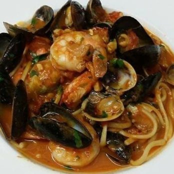 Chef Baker's Place 2 - a plate of pasta with seafood and musselling - American Near Me - Jonesboro, Georgia