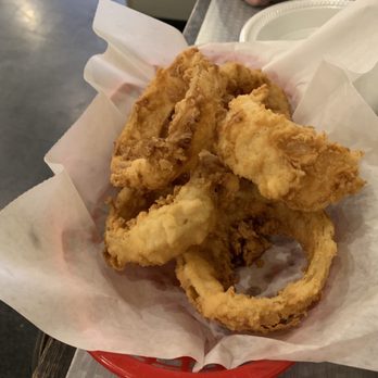 Pop Top Burgers - Thick onion rings cooked fo perfection! - Burgers Near Me - Webster, Texas Pop Top Burgers - Thick onion rings cooked fo perfection! - Burgers Near Me - Webster, Texas