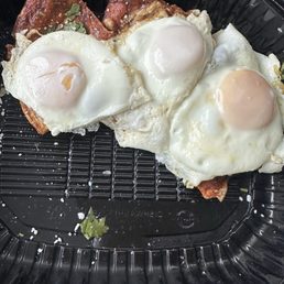 $25 for an extra egg and forgotten avocado. $25 for an extra egg and forgotten avocado.