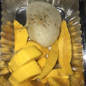 Sweet Basil - Mango sticky rice - don't mine the one with the bite taken out of it I couldn't control myself - Thai Near Me - Woodside, New York Sweet Basil - Mango sticky rice - don't mine the one with the bite taken out of it I couldn't control myself - Thai Near Me - Woodside, New York