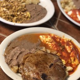 Huevos Rancheros with 2 Eggs, Potatoes and 2 Pork Chops
