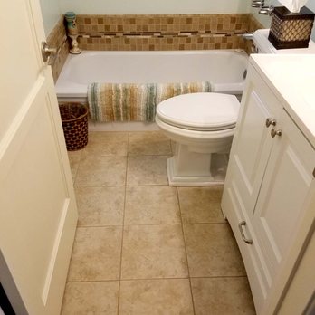 Roberts Tile - tile around the tub and a new floor - Flooring Near Me - Long Beach, California Roberts Tile - tile around the tub and a new floor - Flooring Near Me - Long Beach, California