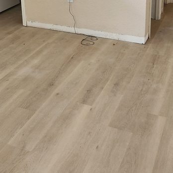 Maple Leaf Hardwood Flooring - Work in progress.  Whole room including walk-in closet. - Flooring Near Me - Plant City, Florida