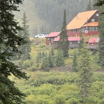 Alexander Lake Lodge - Alexander Lodge and cabin view from across the lake. - Hotels Near Me - Cedaredge, Colorado