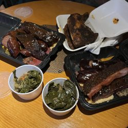 Burch Mountain BBQ - Beef Ribs, Pastrami, Sausage, Quarter Chicken, collard greens, dirty rice, corn bread, cheesy grits.