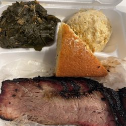 D Chuck Wagon - Brisket plate with collard greens, potato salad, and corn bread. Also comes with a drink and dessert.