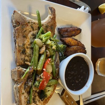 Abuela's Kitchen - Pork chop special with black beans & Sweet Plantains - Maduros - Sandwiches Near Me - Palmetto, Florida Abuela's Kitchen - Pork chop special with black beans & Sweet Plantains - Maduros - Sandwiches Near Me - Palmetto, Florida