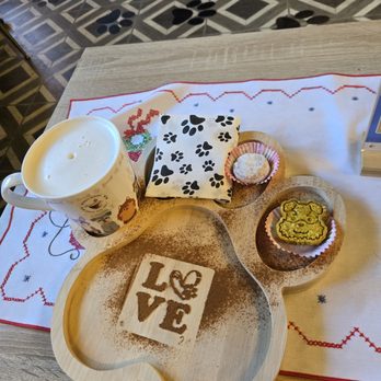 Honney Doffee - Nutella latte wasn't overly sweet & came with a pastry but idk what it was. Also got a cute carrot cake dog treat for puppy. - Coffee & Tea Near Me - National City, California