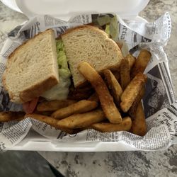 Sicilian Delite Pizzeria & Ristorante - Prosciutto sandwich and fries.