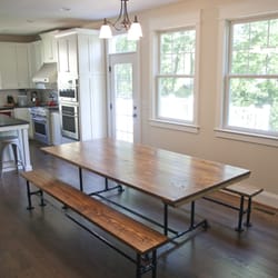 Emmor Works - 7' Industrial Style Table. Solid Wood top stained Early American with Industrial metal pedestal base.