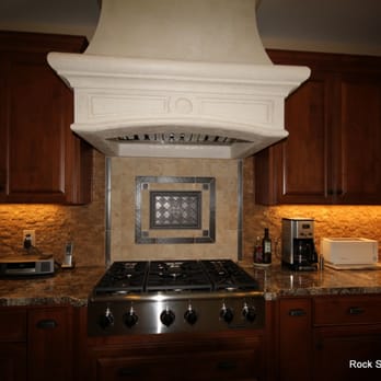 Rock Solid Creations - a range hood in a kitchen - Flooring Near Me - Groveland, California