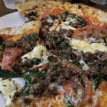 Manor Hill Tavern - Margherita pizza with spinach and ribeye - Bars Near Me - Ellicott City, Maryland