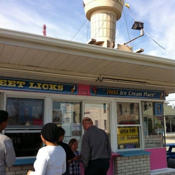 Sweet Licks - a group of people standing outside of a ice cream shop - Ice Cream & Frozen Yogurt Near Me - North Providence, Rhode Island