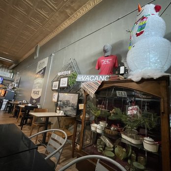 The Burrow - a table and chairs in a restaurant - Coffee & Tea Near Me - Claude, Texas
