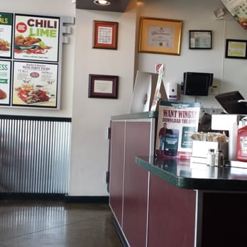 Wingstop - a view of a restaurant counter - Chicken Wings Near Me - Hialeah, Florida