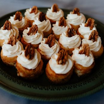Le Petit Sweet - a plate of cupcakes on a table - Coffee & Tea Near Me - Mount Dora, Florida