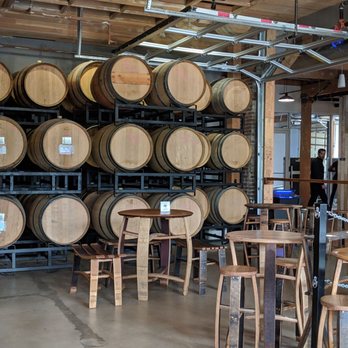 Ruse Brewing - Barrels and seating area - Breweries Near Me - Portland, Oregon