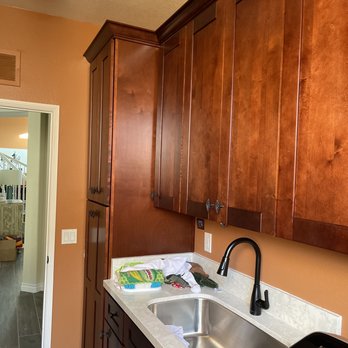 EM Construction and More - a kitchen with wood cabinets - Plumbing Near Me EM Construction and More - a kitchen with wood cabinets - Plumbing Near Me