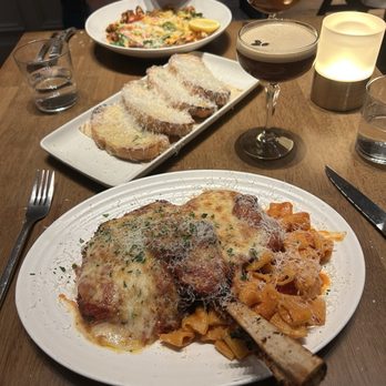 Olivia - Veal chop, Lemon Fettuccine pasta with lobster and shrimp and of course garlic bread. - Pizza Near Me - St. Petersburg, Florida Olivia - Veal chop, Lemon Fettuccine pasta with lobster and shrimp and of course garlic bread. - Pizza Near Me - St. Petersburg, Florida
