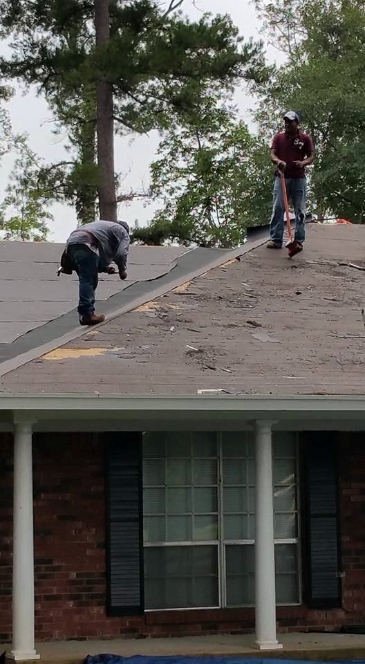 Slide of A-1 roofing and remodeling