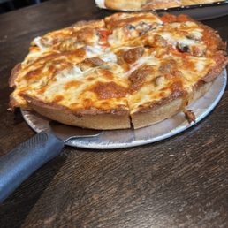 Oley's Style Deep Dish with pepperoni and mushrooms.