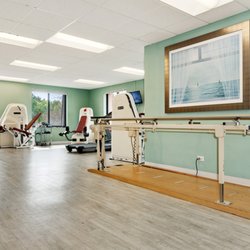 West Suburban Nursing & Rehabilitation Center - Therapy gym is bright, open and airy with the latest equipment.