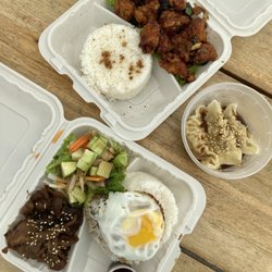 Momo Express - Pork rice bowl, garlic popcorn chicken special, steamed dumplings.