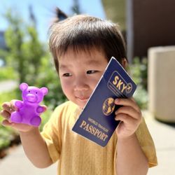 Sky Pediatric Dentistry - Happy with a little toy and her new Sky passport