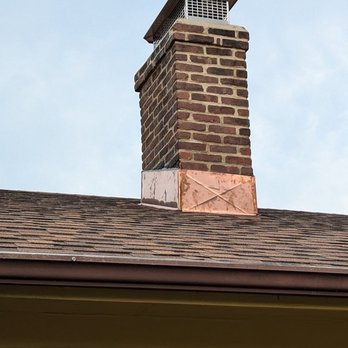 Rabbit Roofing - Copper chimney flashing, not stepped. - Roofing Near Me