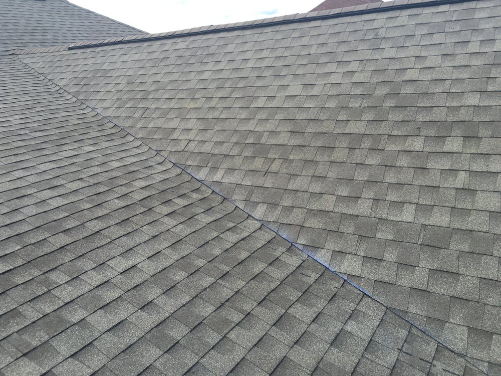 Slide of Up & Over Roofing